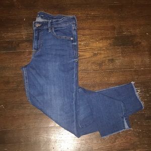 Super Skinny denim with distressed bottoms
